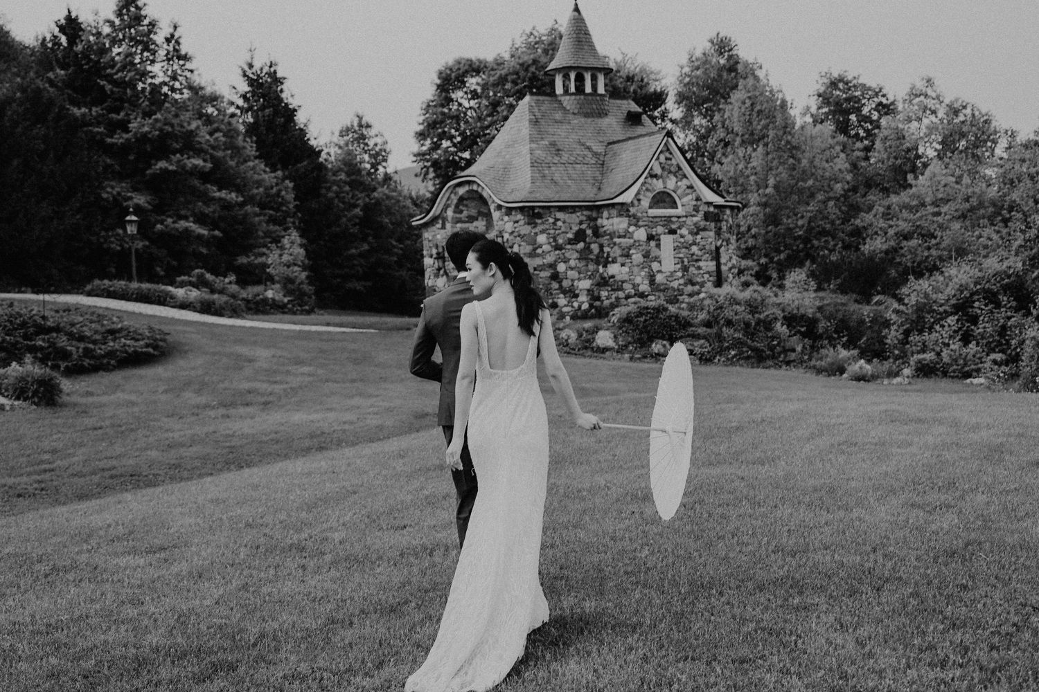 Bride & groom with umbrella