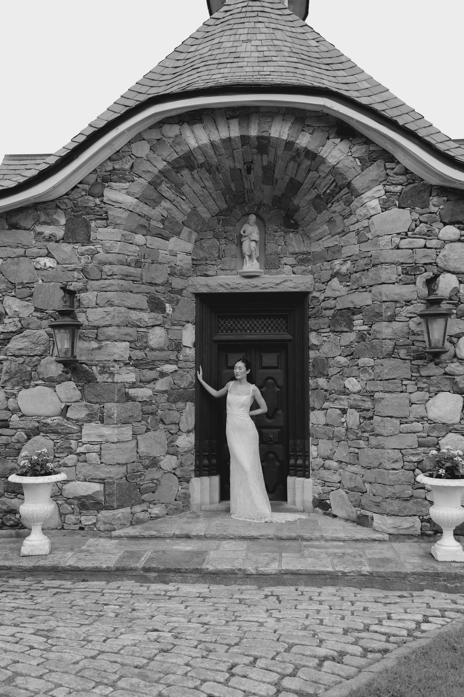 Bride in front of a chapel