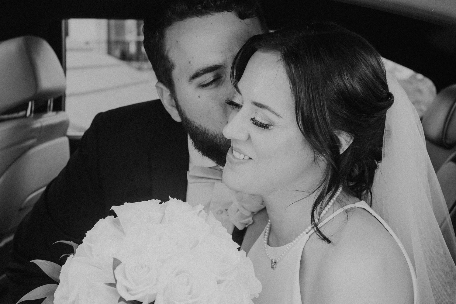 Kissing in the car wedding