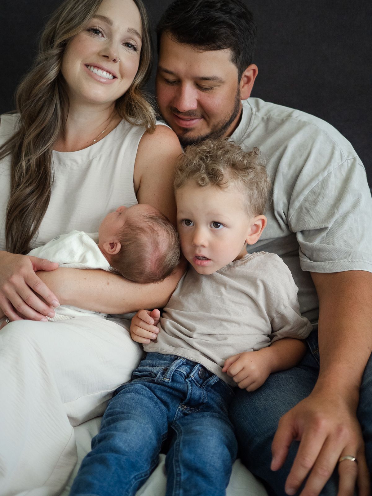 Cozy in-home newborn photography with family