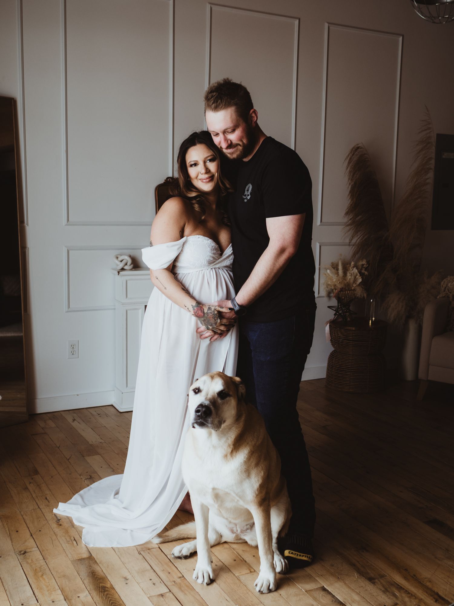 Soft studio maternity portrait with window light