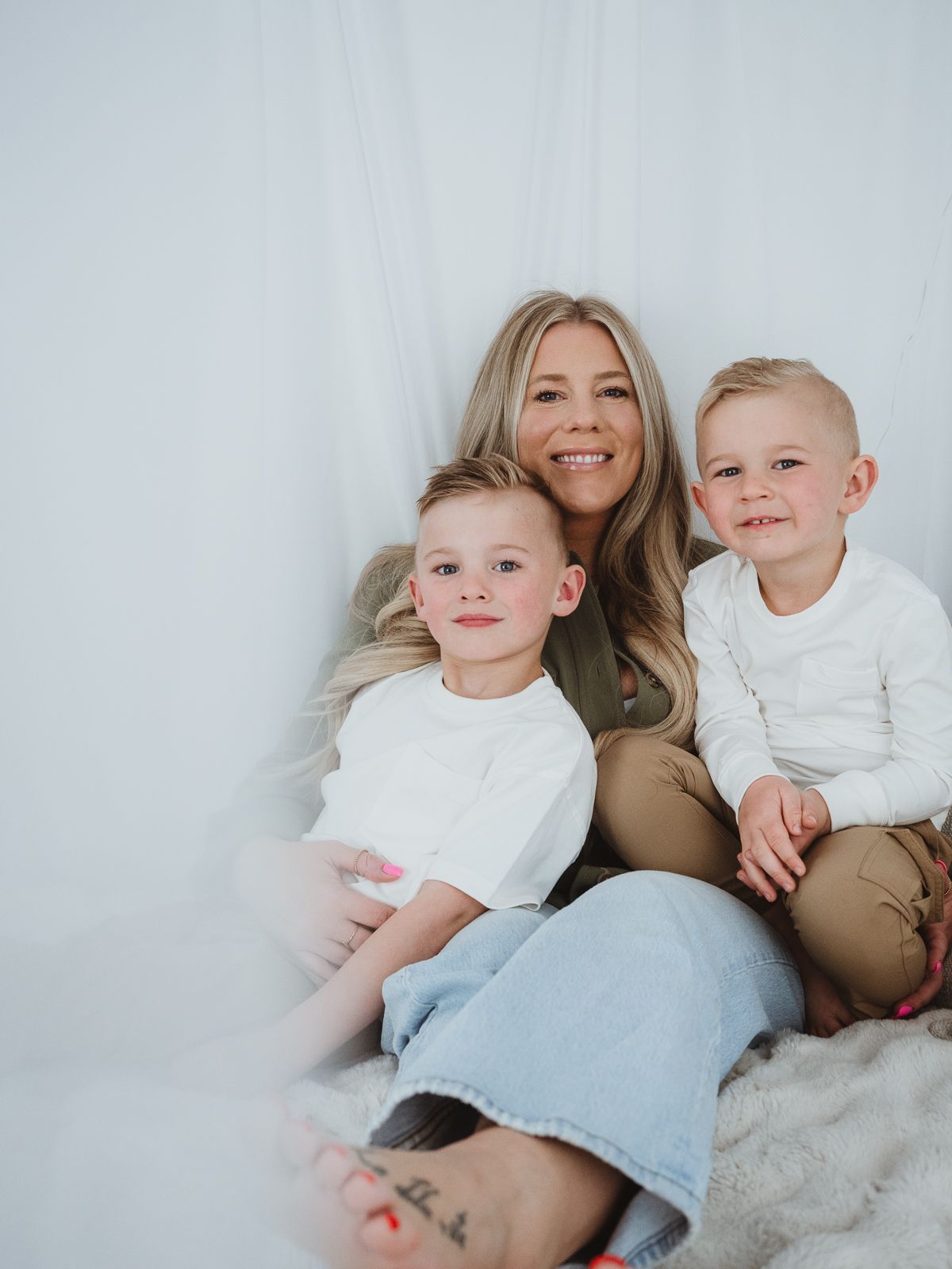 family session captured by coral konanz photography, in her stony plain studio