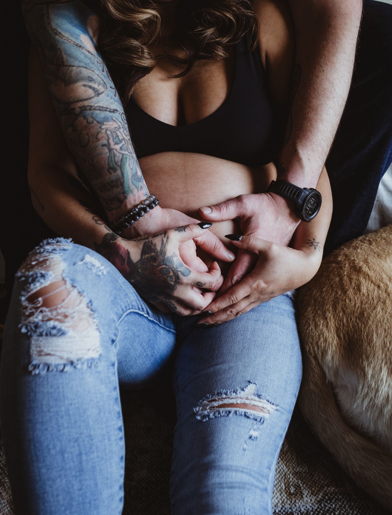 Soft studio maternity portrait with window light