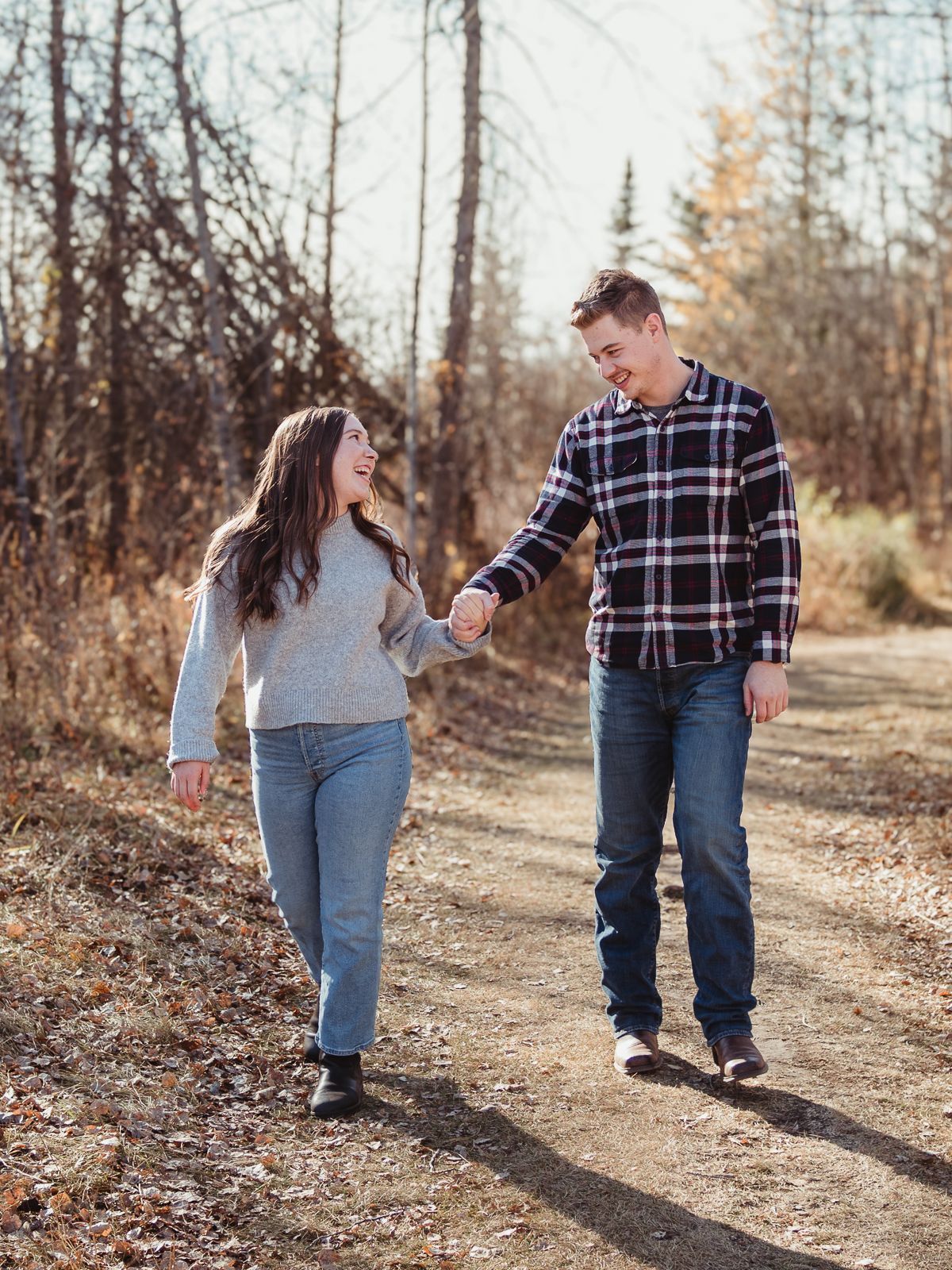 Candid couple dancing during outdoor session
