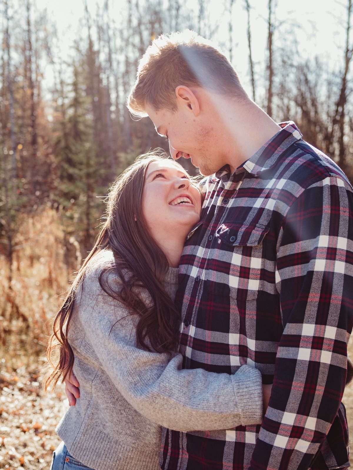 Candid couple dancing during outdoor session