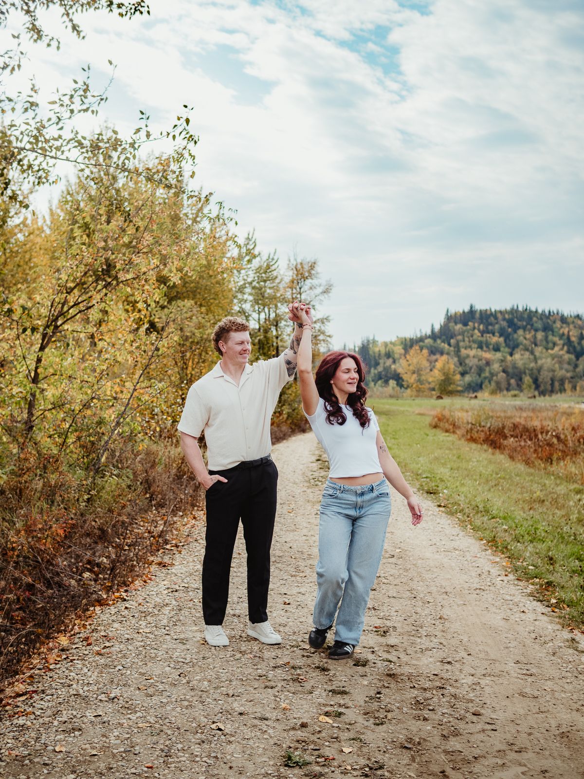 Couple cuddling during outdoor photography session