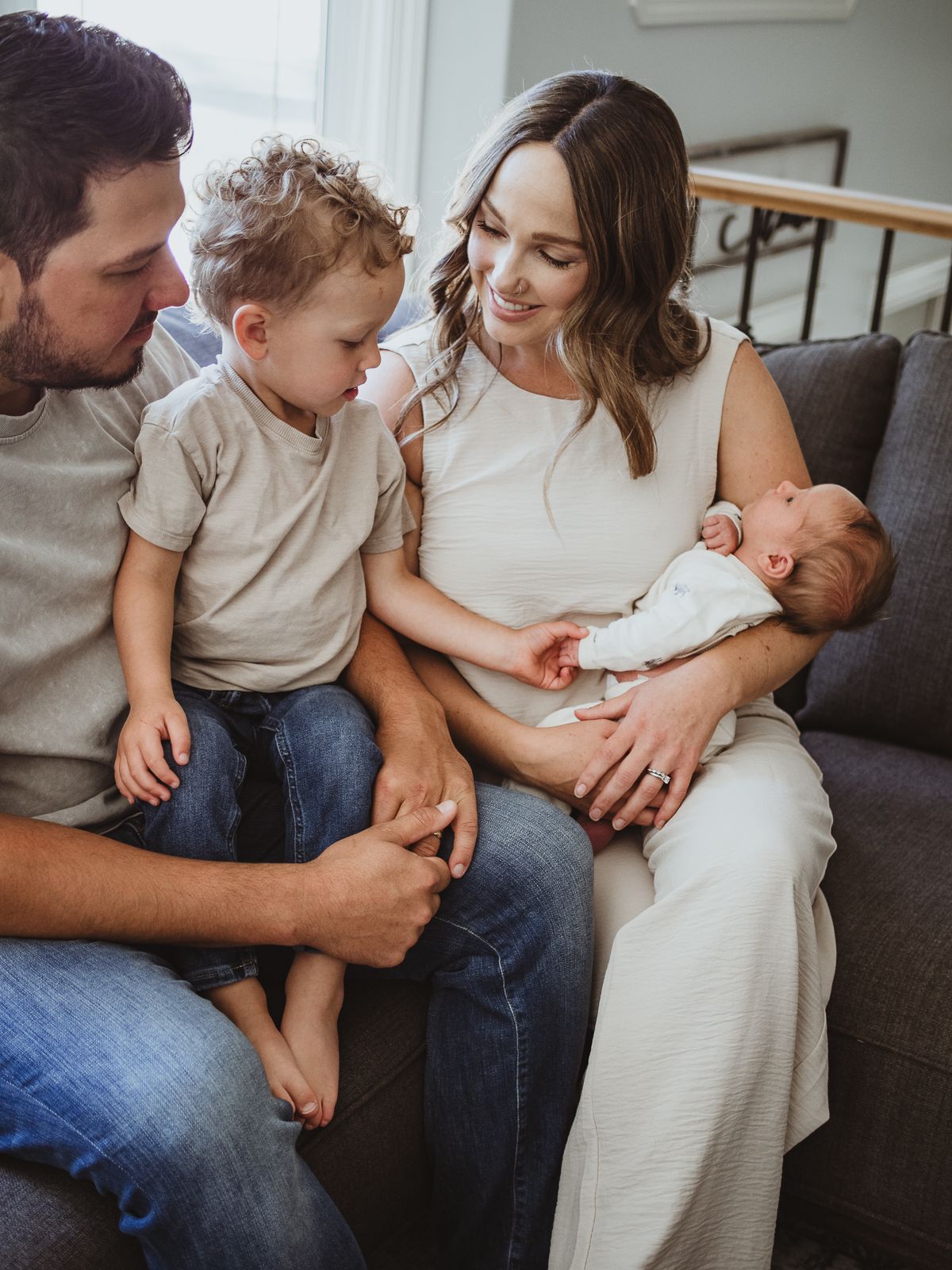 Cozy in-home newborn photography with family