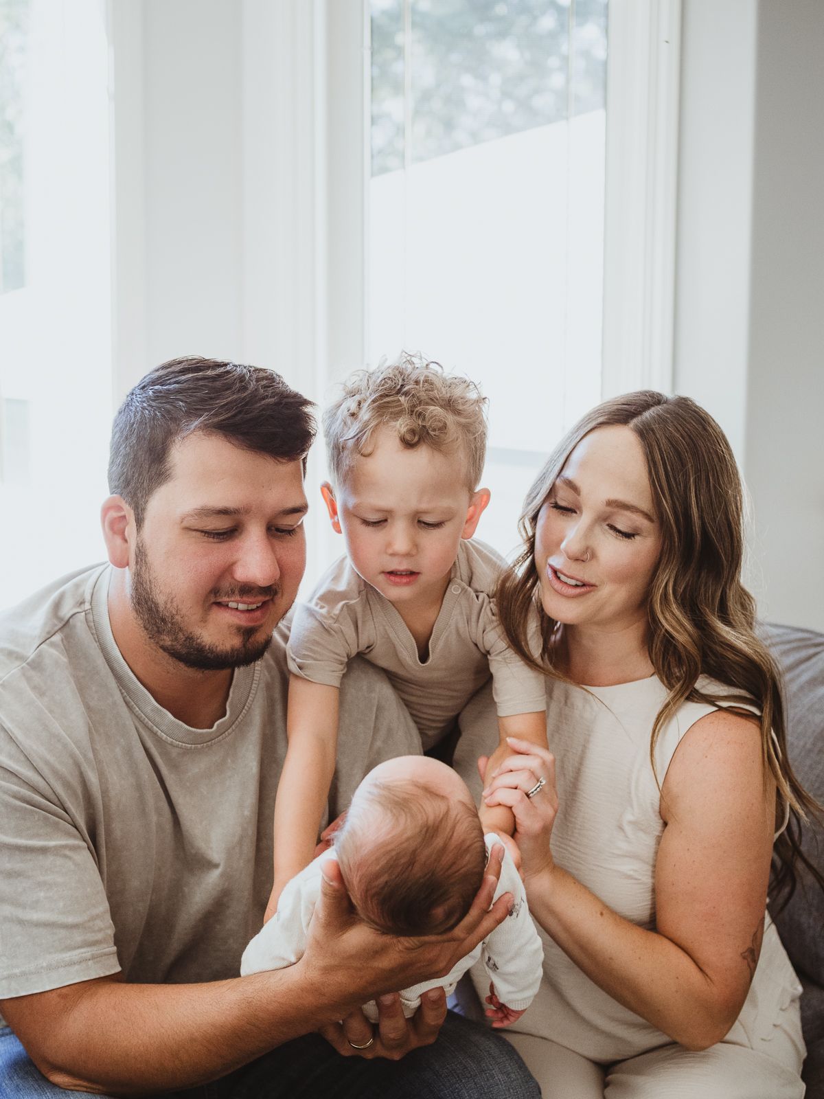 Cozy in-home newborn photography with family