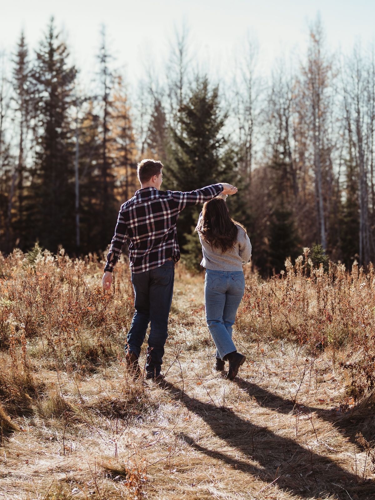 Candid couple dancing during outdoor session