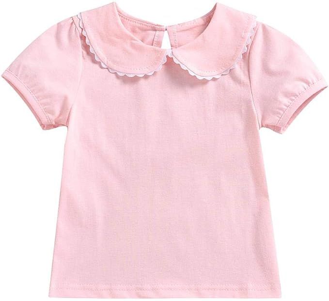 Pink cotton baby t-shirt with Peter Pan collar and short sleeves.