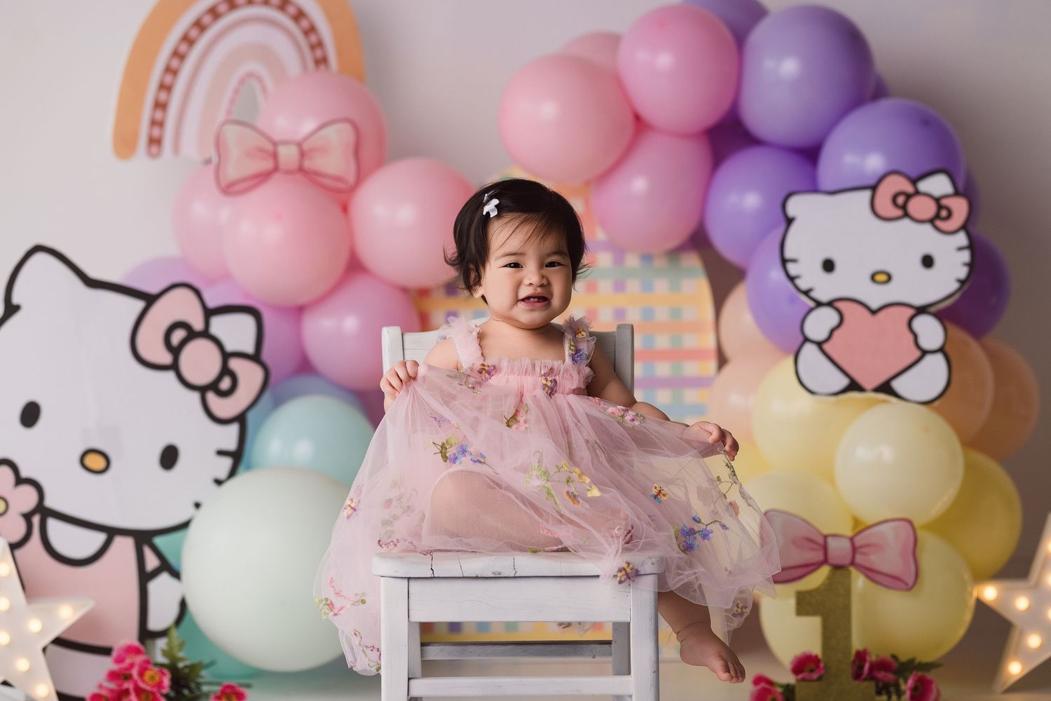 One year old during her themed cake smash session with Bree Elle Photography in Port Neches, TX.