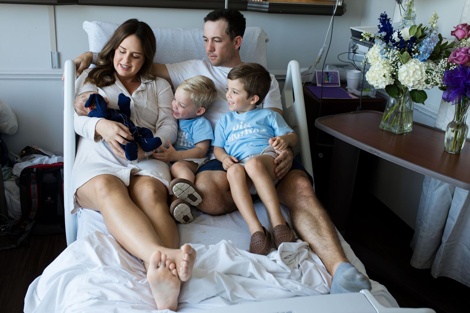 Family meeting their newborn during Fresh 48 session in Beaumont, TX at St. Elizabeth with Bree Elle Photography.