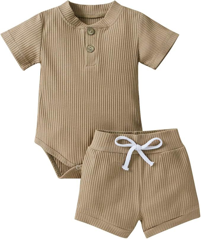 Matching beige ribbed knit baby shorts and t-shirt set with white drawstring bow detail displayed in multiple angles.