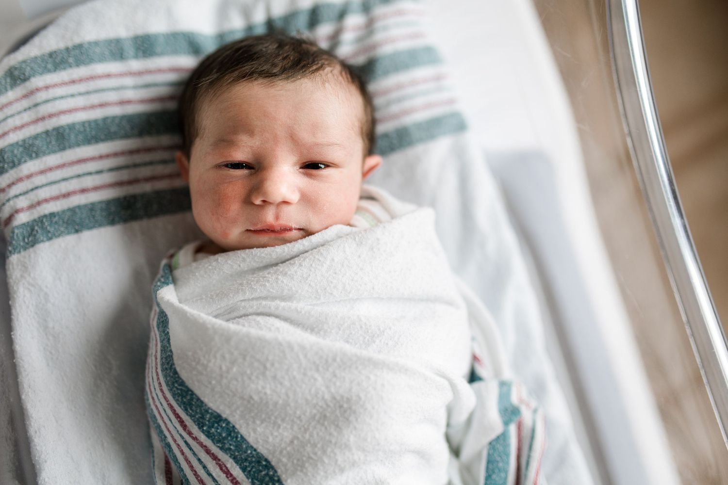 Newborn baby during Fresh 48 session at Baptist Hospital in Beaumont, TX. Photographed by Bree Elle Photography.