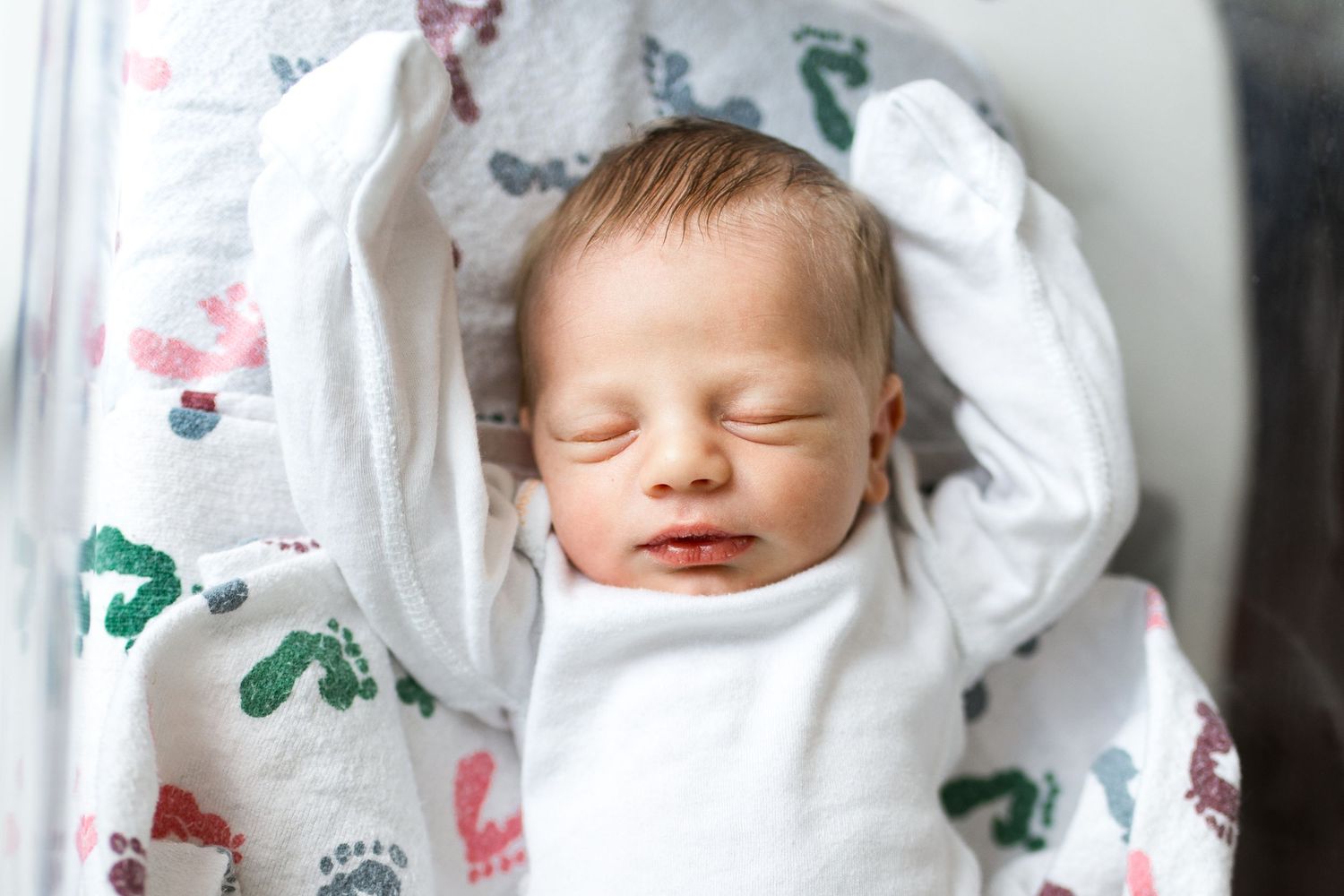 Newborn baby during Fresh 48 session in St. Elizabeth hospital with Bree Elle Photography.