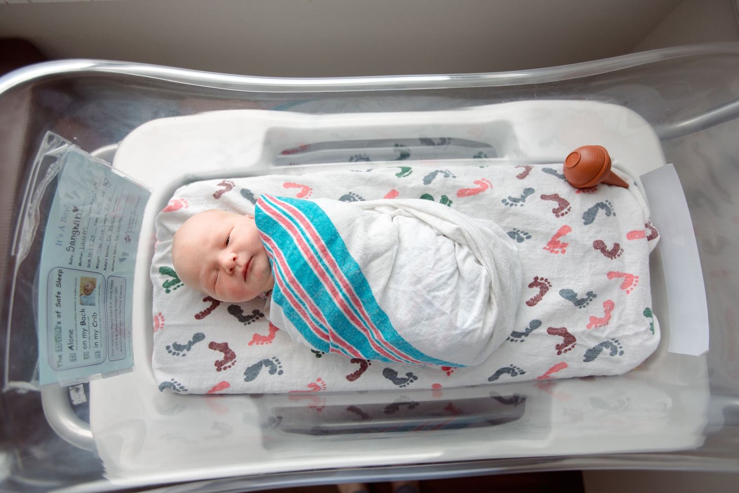 Baby swaddled in bassinet during Fresh 48 session in Beaumont hospital.