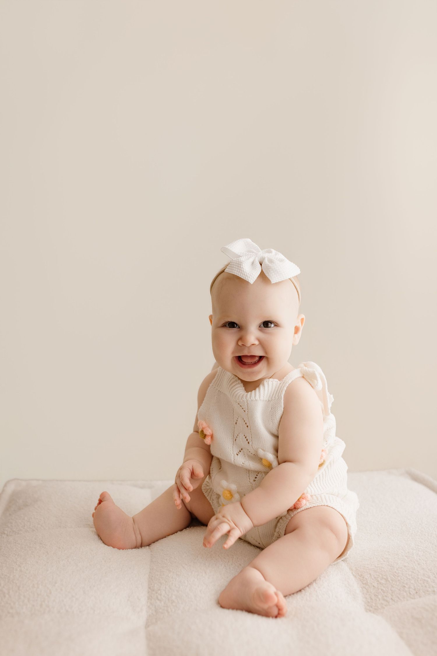6 month old during her milestone session with Bree Elle Photography in Port Neches, TX studio.