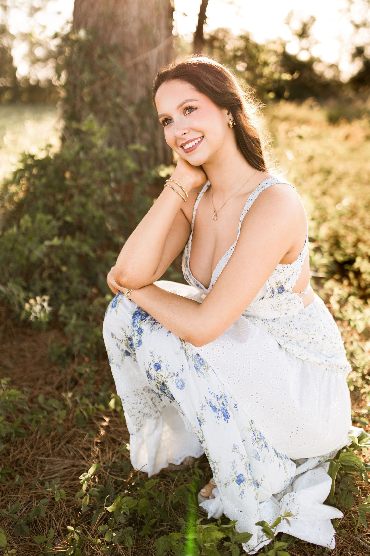Bree Elle Photography Seniors by Alicia Stephenson. Session with girl in a Beaumont, TX field during senior year photo session.