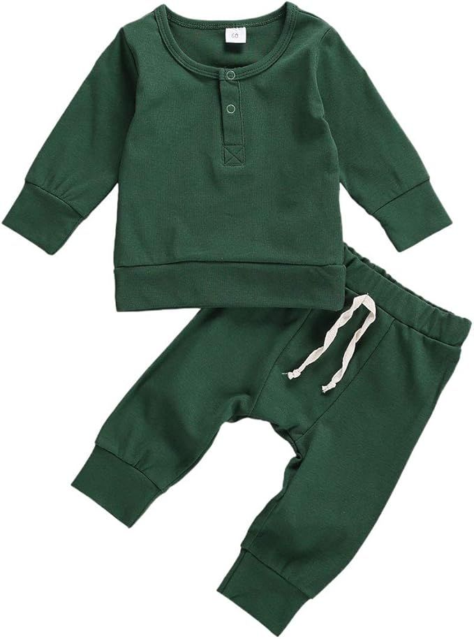 A dark green baby clothing set featuring a long-sleeve henley top and matching jogger pants with drawstring waist.