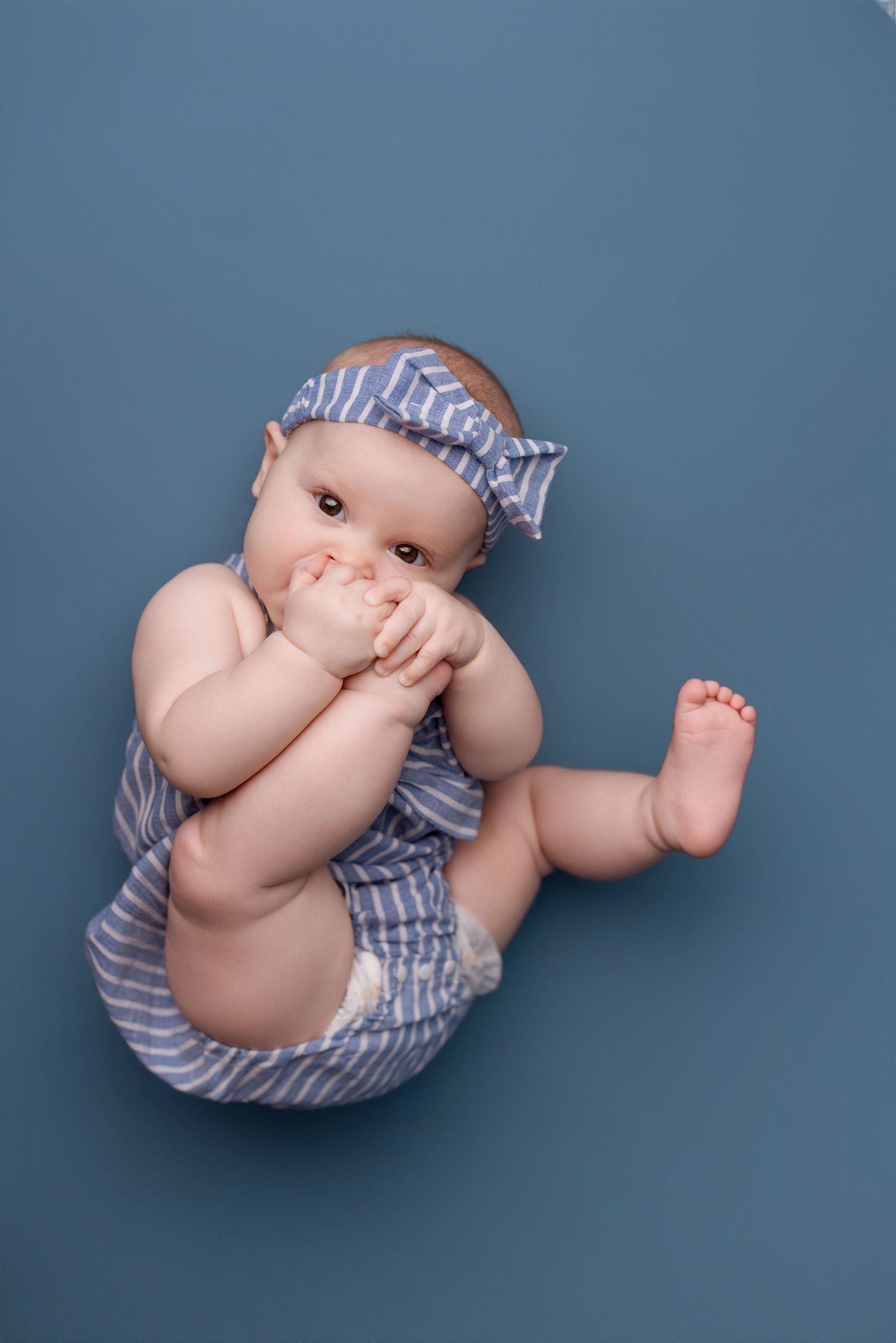 6 month old during her milestone session with Bree Elle Photography in Port Neches, TX studio.