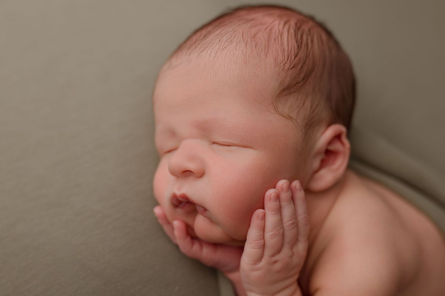 Newborn during session with Bree Elle Photography in Port Neches, TX studio.