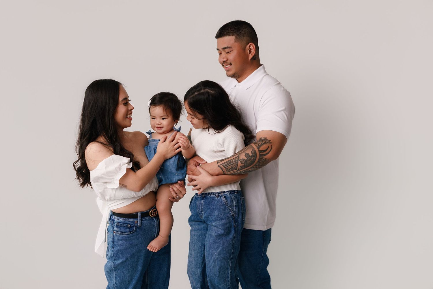 One year old family portion with sibling during one year session Bree Elle Photography in Port Neches, TX.