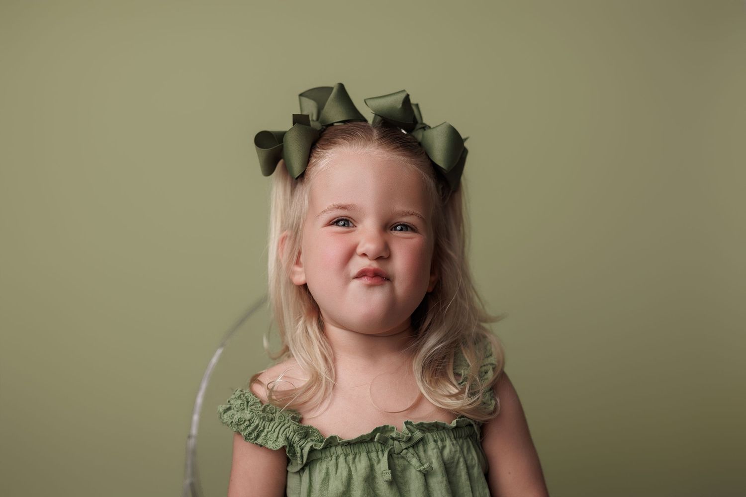 Three year old during portrait portion of session with Bree Elle Photography in Port Neches, TX.