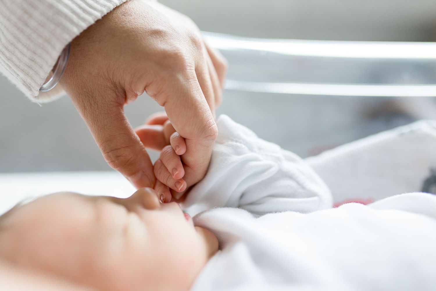 Newborn baby during Fresh 48 session at St. Elizabeth hospital in Beaumont, TX with Bree Elle Photography.