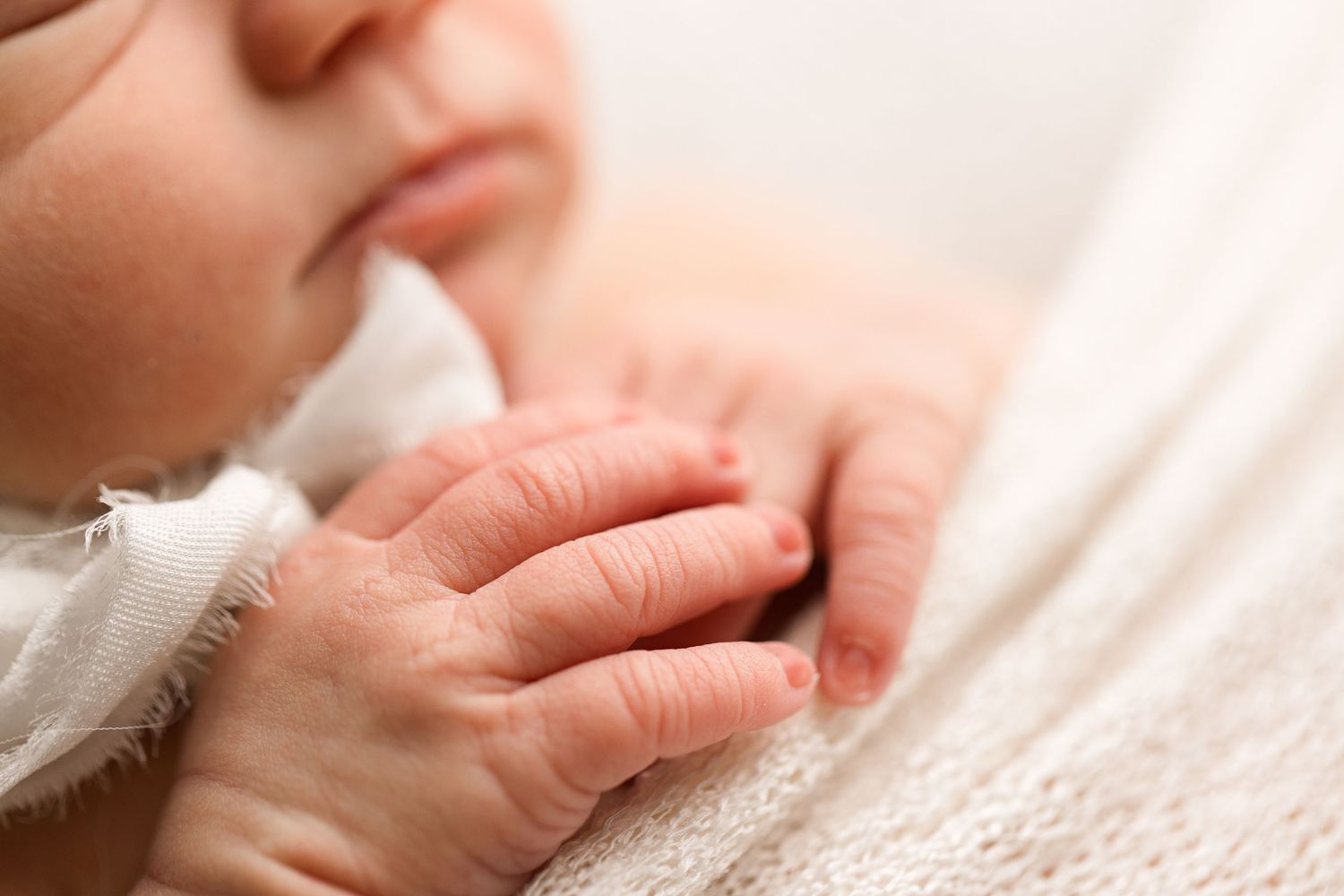 Newborn baby during studio session in Nederland, TX with Bree Elle Photography.