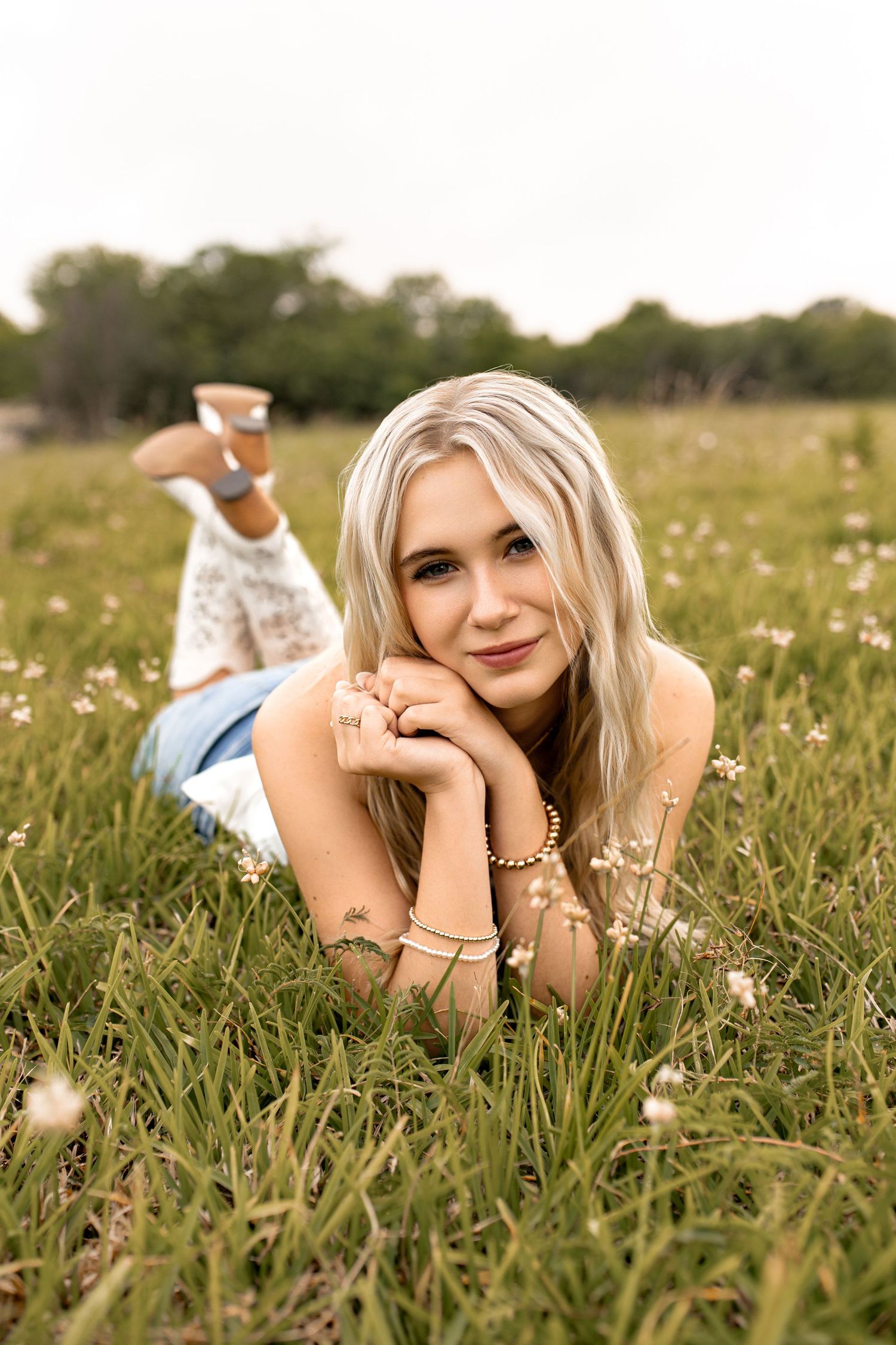 Senior photography session held in a field in Beaumont, TX by Bree Elle Photography Seniors by Alicia Stephenson.