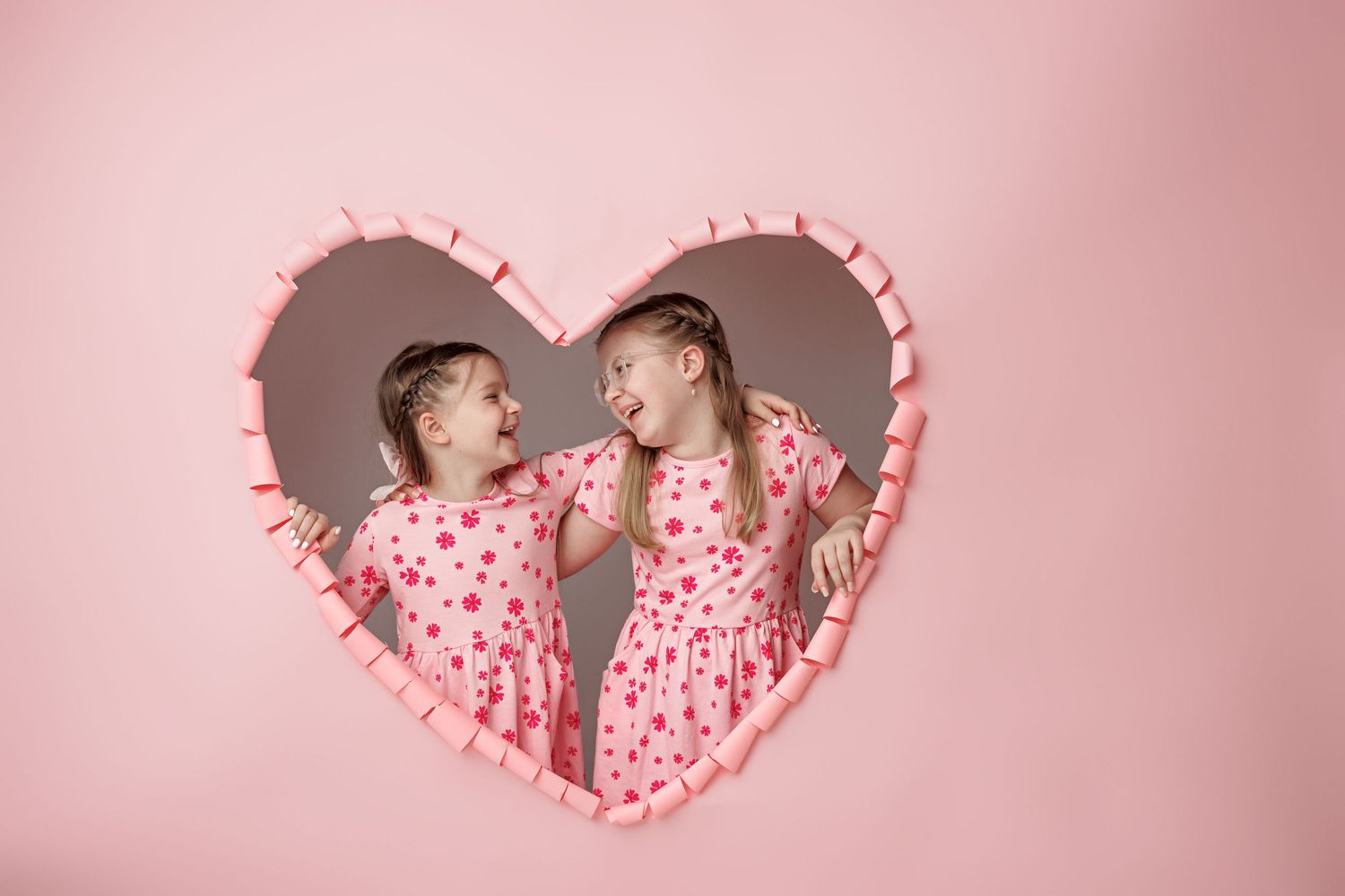 Series of Valentine's themed photos with heart-shaped cutouts and pink background.