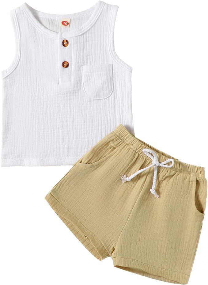 White sleeveless cotton tank top with buttons and beige elastic waist shorts make up this casual summer children's outfit.