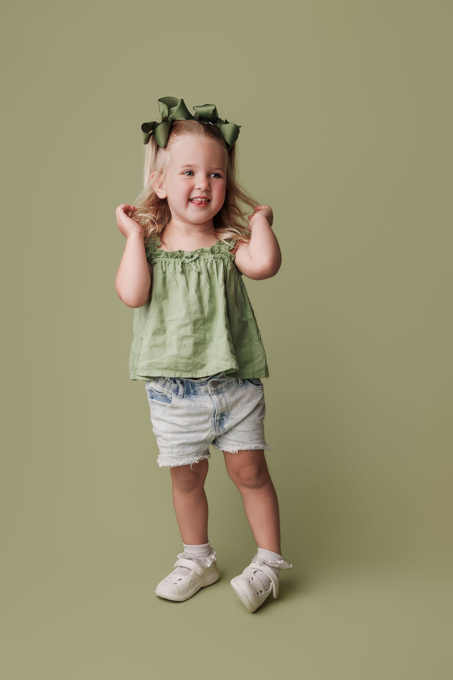 Three year old during portrait session at Bree Elle Photography. Beaumont, TX.