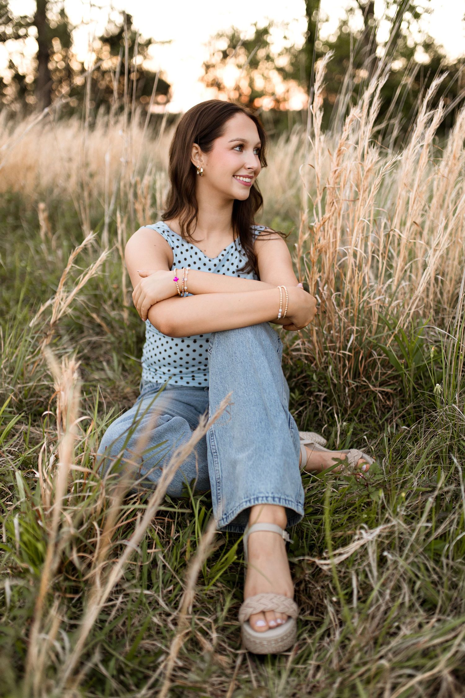 Bree Elle Photography Seniors by Alicia Stephenson. Session with girl in a Beaumont, TX field during senior year photo session.