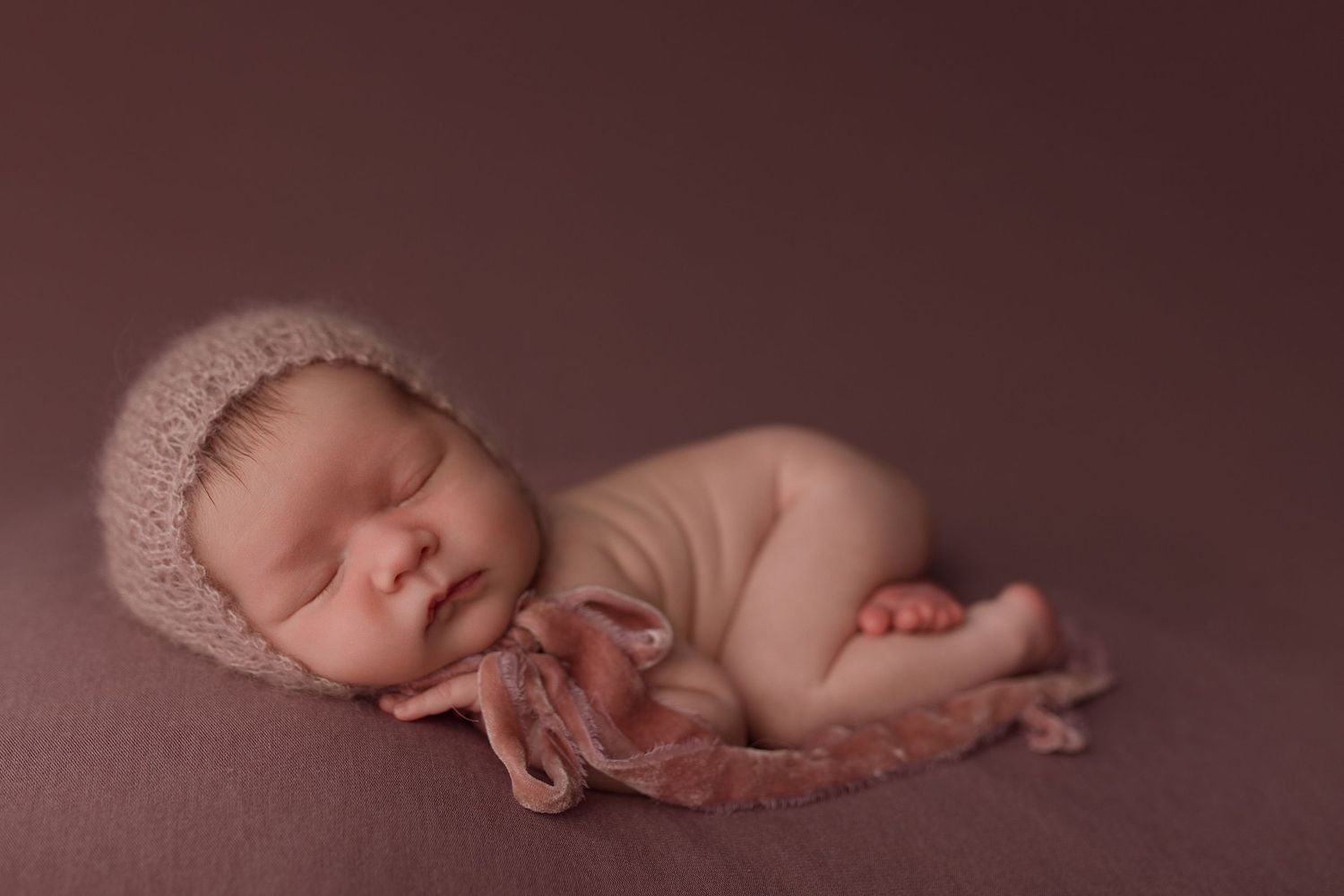 Baby girl during newborn session with Bree Elle Photography in Beaumont, Tx.