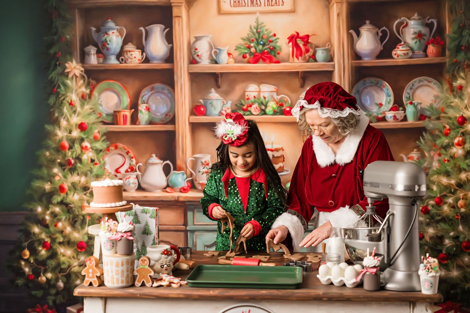 Two people in holiday attire baking Christmas treats at a vintage-styled workstation with decorative shelving.