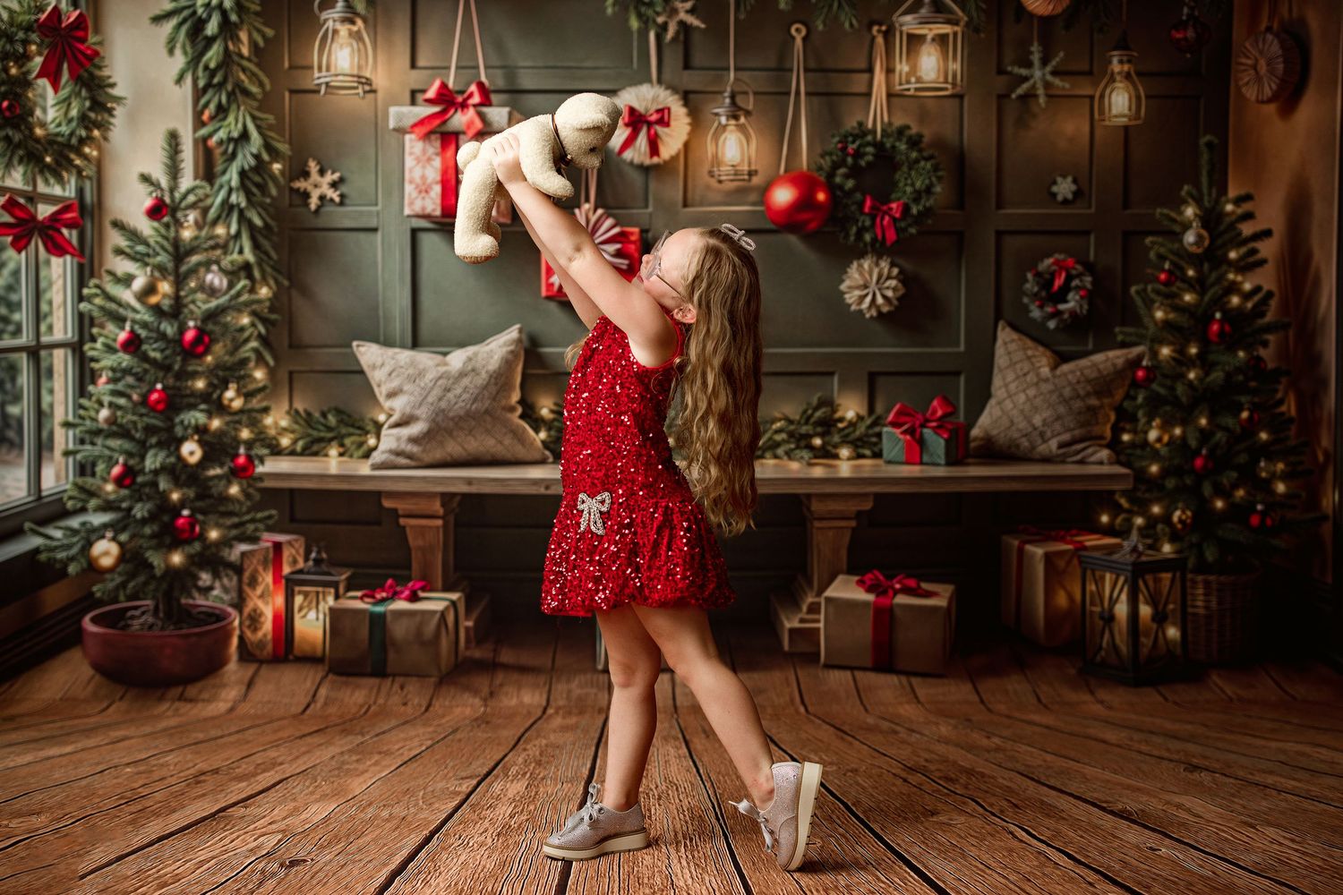 Festive Christmas interior with decorated tree, lanterns, and red ornaments creating a warm holiday atmosphere.