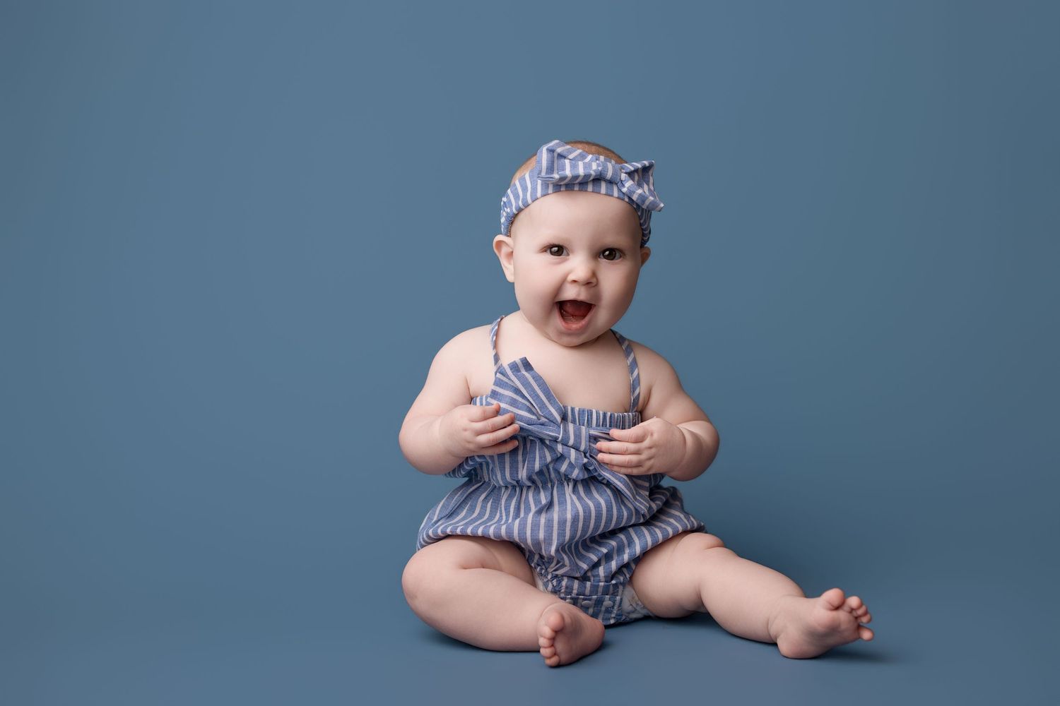 6 month old during her milestone session with Bree Elle Photography in Port Neches, TX studio.
