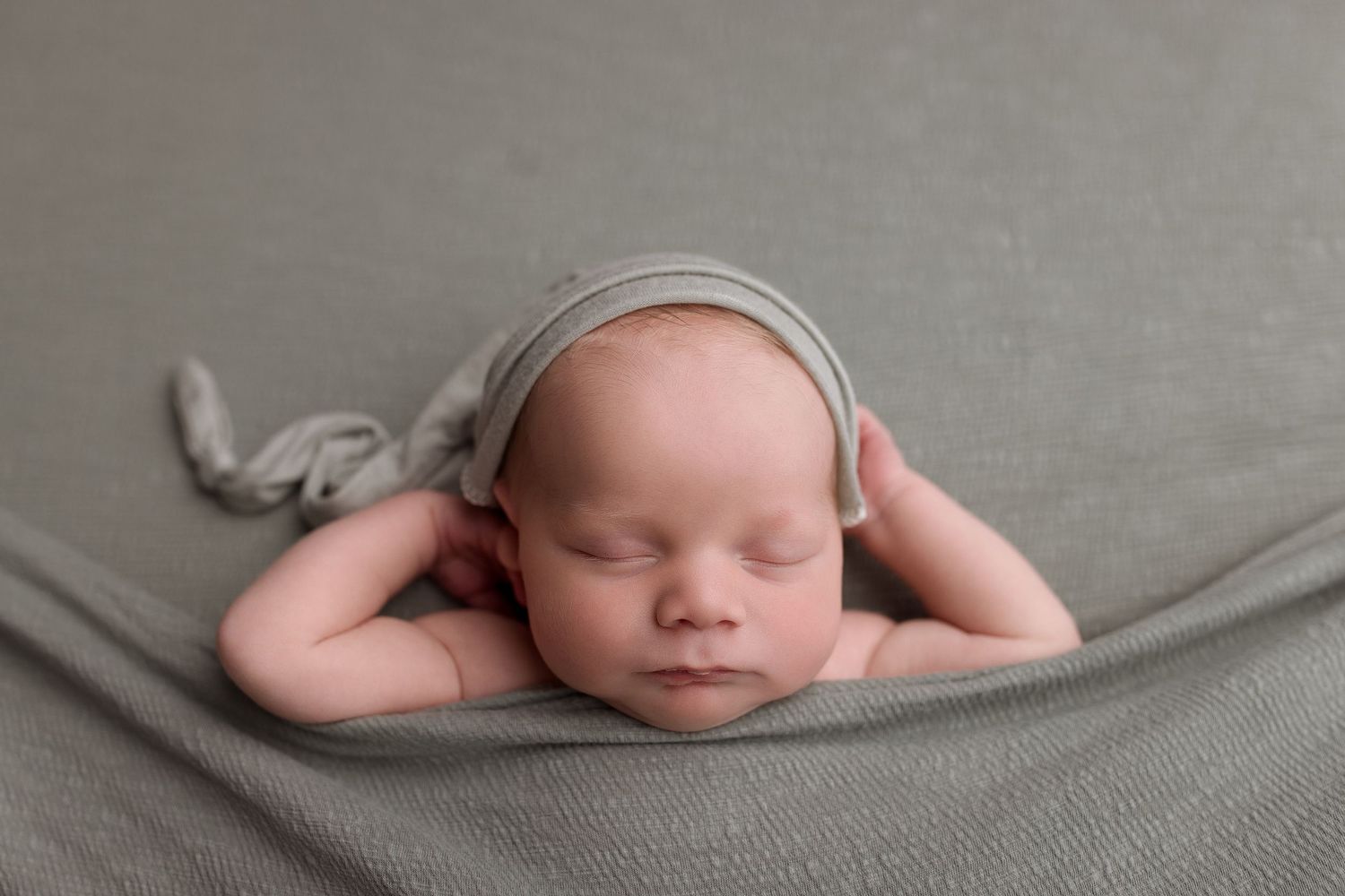 Newborn baby during newborn session with Bree Elle Photography in Port Neches, TX studio. Lumberton, Silsbee, Beaumont, Nederland, Southeast