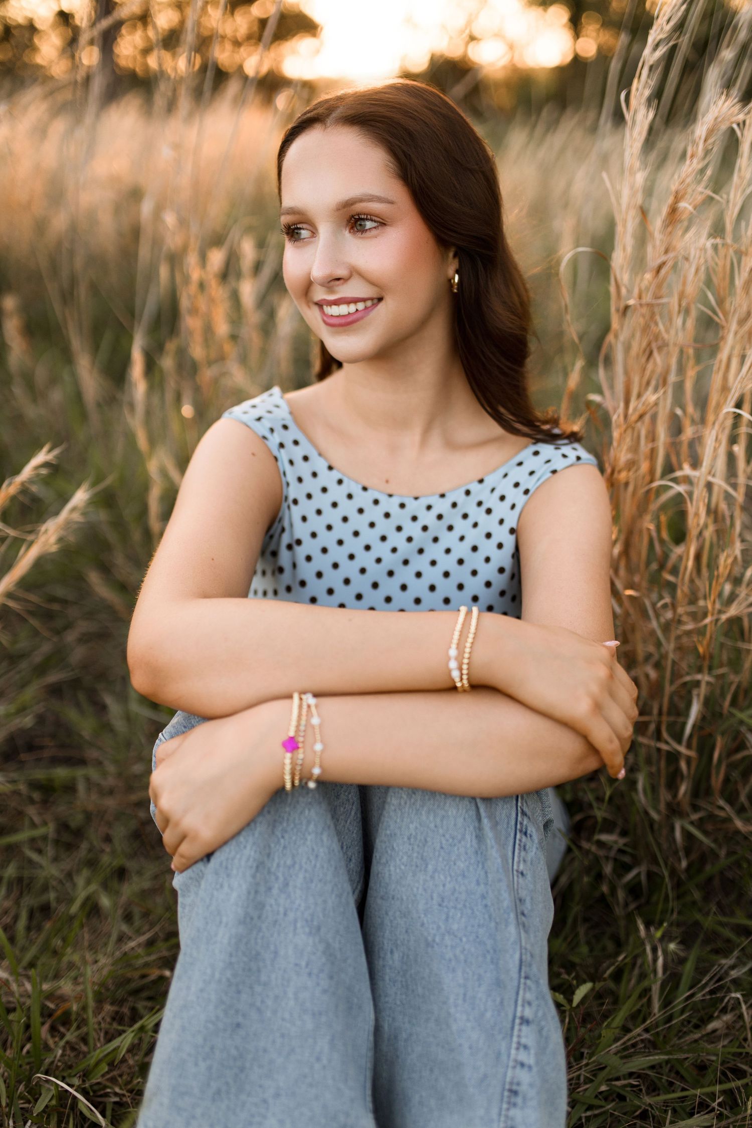 Bree Elle Photography Seniors by Alicia Stephenson. Session with girl in a Beaumont, TX field during senior year photo session.
