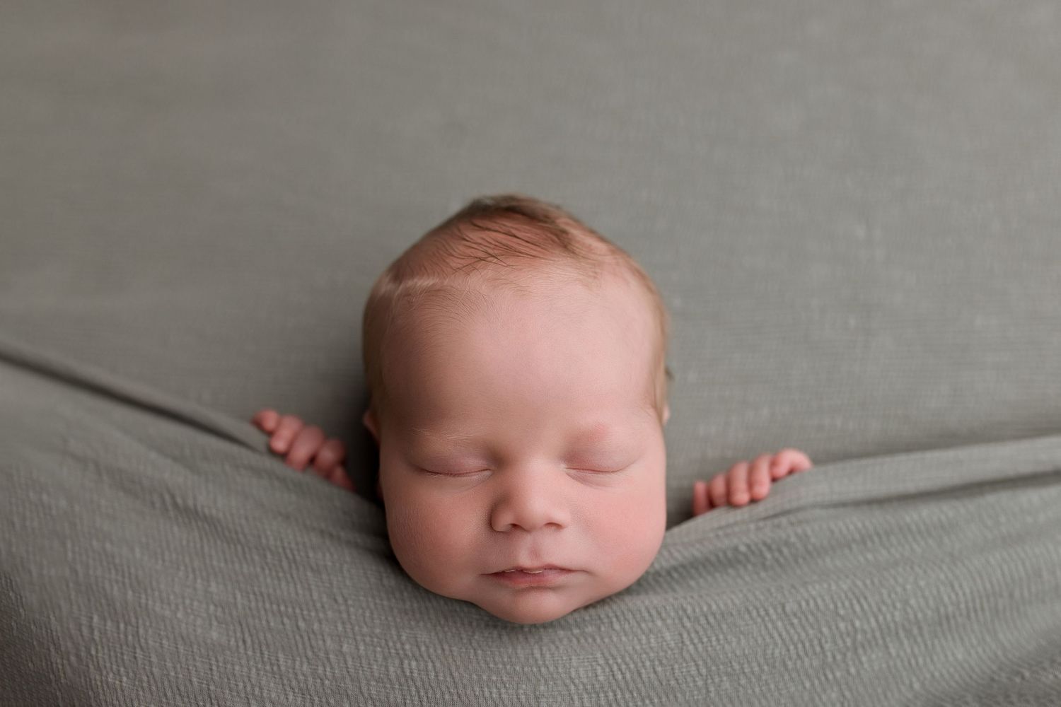 Newborn baby during newborn session with Bree Elle Photography in Port Neches, TX studio. Lumberton, Silsbee, Beaumont, Nederland, Southeast
