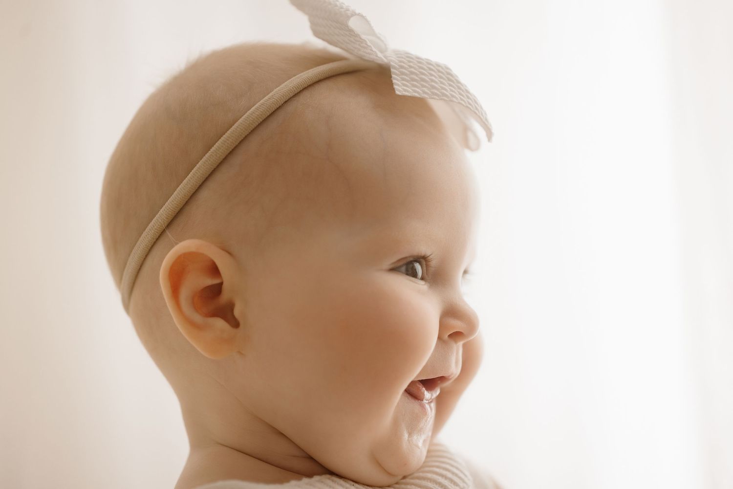 6 month old during her milestone session with Bree Elle Photography in Port Neches, TX studio.