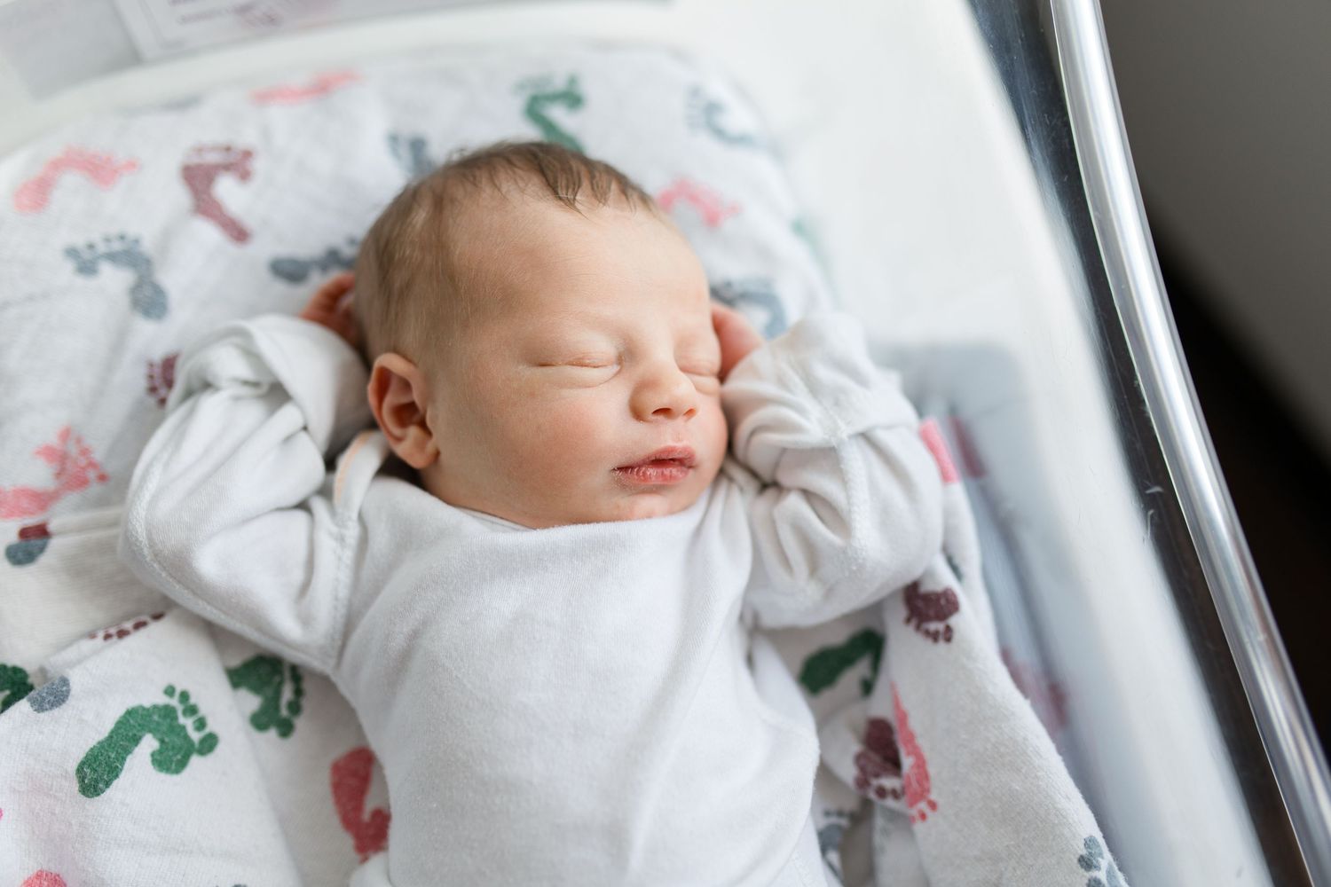Newborn baby during Fresh 48 session at St. Elizabeth hospital in Beaumont, TX with Bree Elle Photography.
