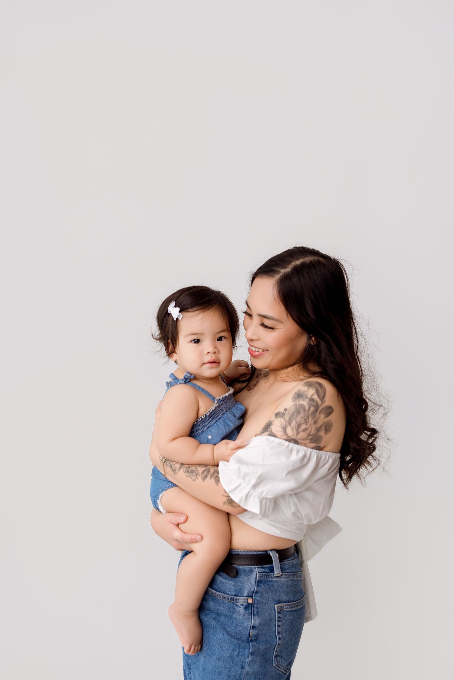 One year old family portion with sibling during one year session Bree Elle Photography in Port Neches, TX.