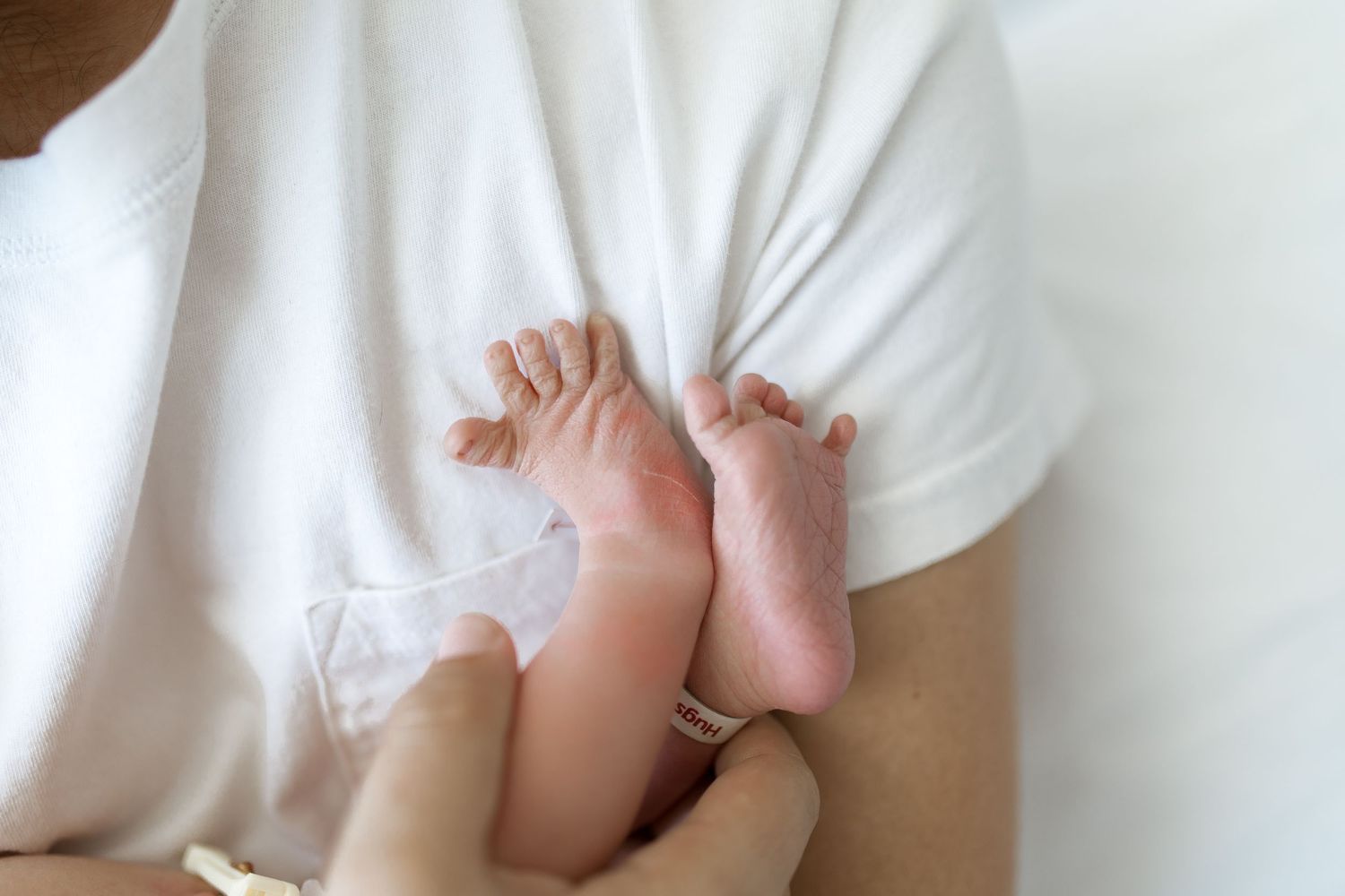 Newborn baby during their Fresh 48 session with Bree Elle Photography in Beaumont, TX at St. Elizabeth hospital.