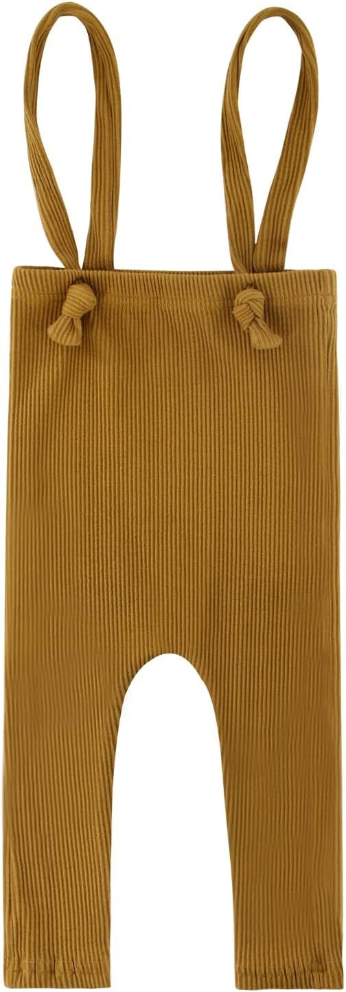 Brown ribbed knit high-waisted pants with suspender straps laid flat against white background.