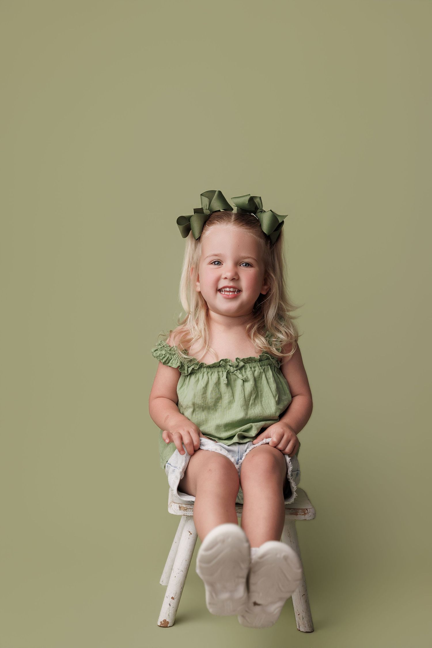 3 year old toddler girl during portrait session at Bree Elle Photography in Port Neches, Tx.