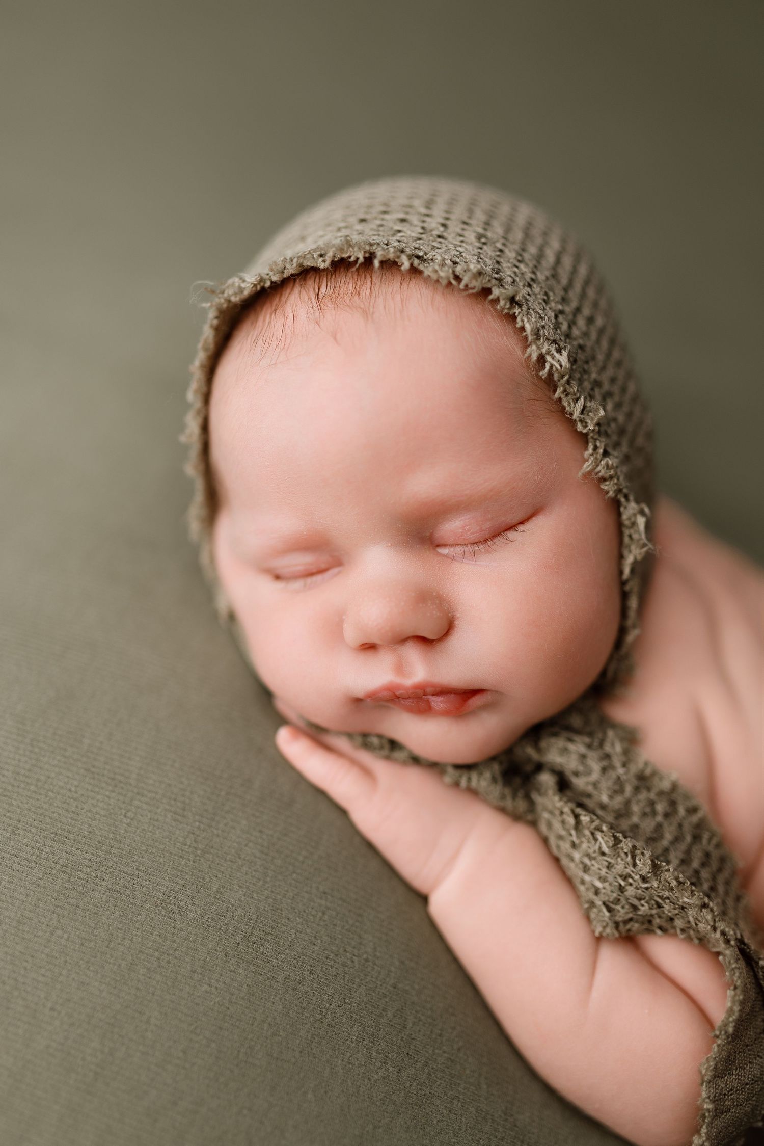 Newborn baby during photography session in Port Neches with Bree Elle Photography