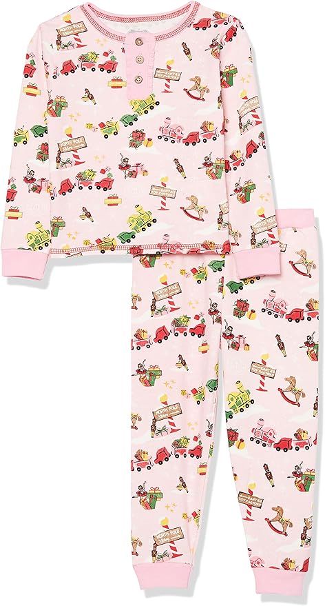 Pink baby pajama set with playful animal print pattern and ribbed cuffs in soft cotton fabric.