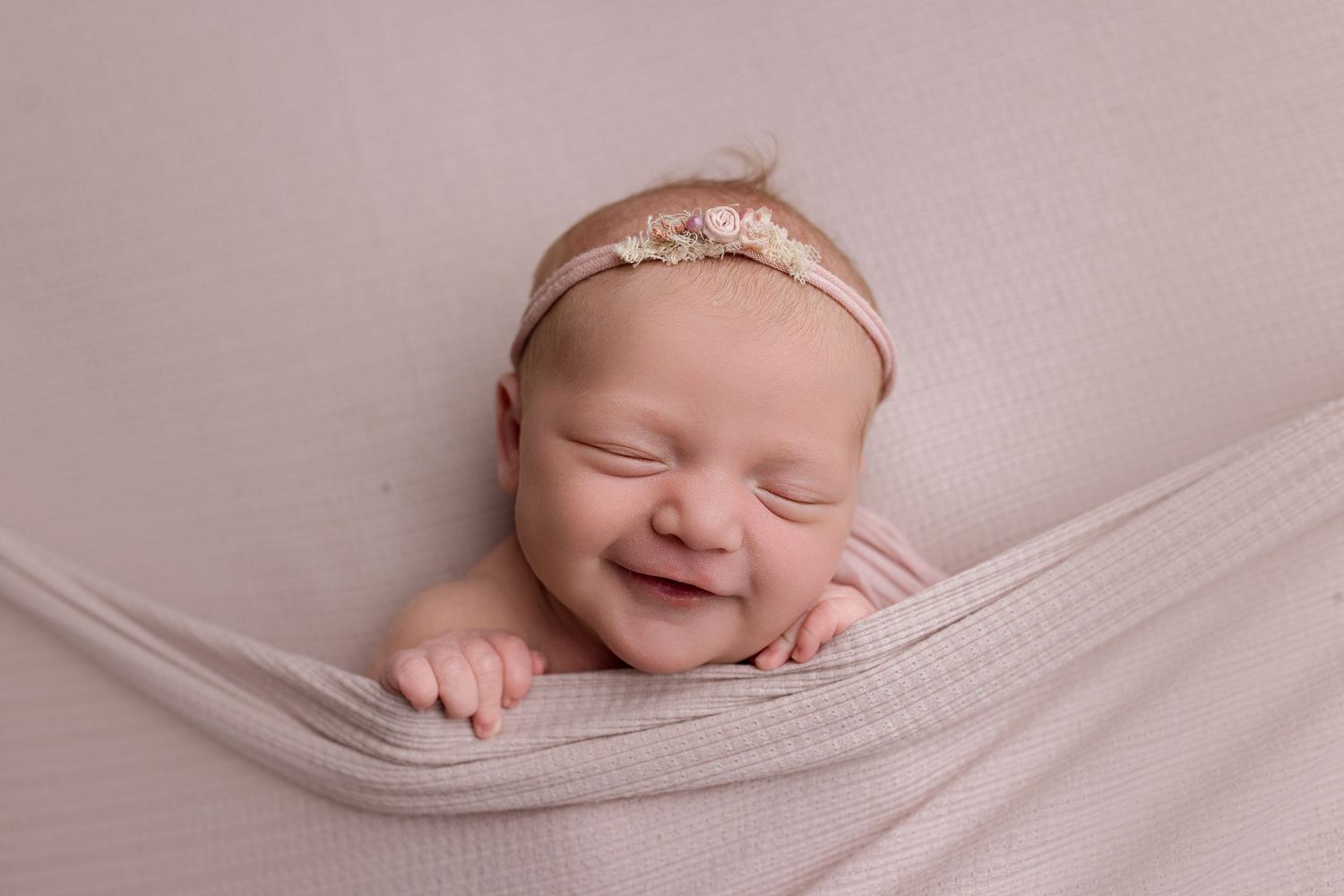 Newborn baby during studio session in Beaumont, TX with Bree Elle Photography.
